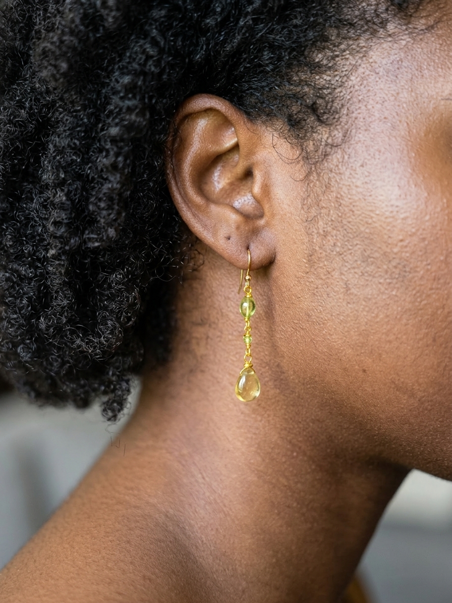 Adella - featuring Smooth Natural Peridot Flat Ovals, Faceted Natural Peridot Rounds, Smooth Grossular Garnet Briolettes, Gold Plated Stainless Steel Wire, Gold Plated Copper Wire, Gold Plated Brass Chain, Gold Plated Stainless Steel Ear Hooks angle 2