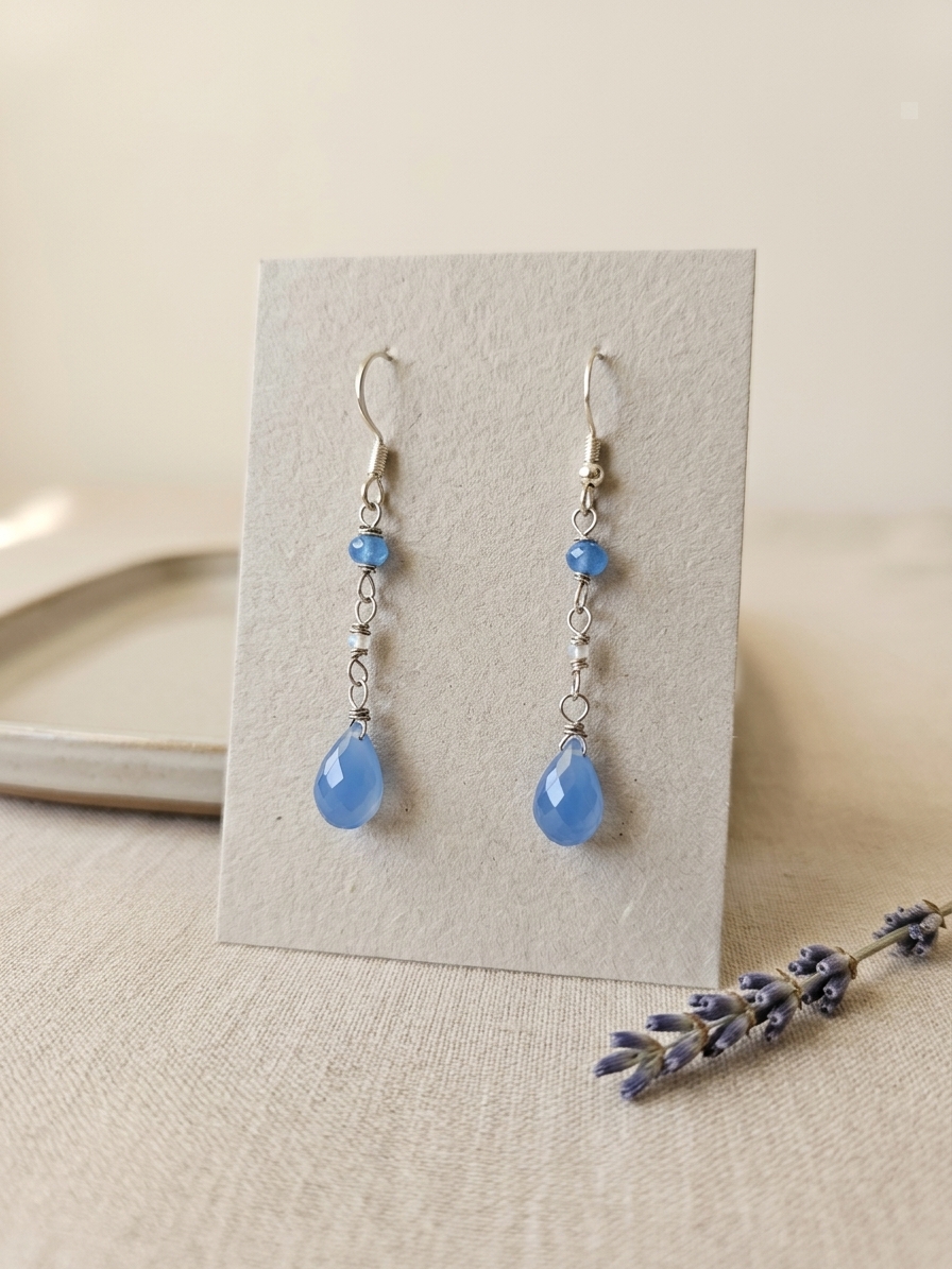 Aquata - featuring Faceted Periwinkle Blue Chalcedony Briolettes, Faceted Periwinkle Blue Chalcedony Rondelles, Stainless Steel Wire, Silver Tone Copper Wire, Nickel Free Stainless Steel Ear Hooks angle 3