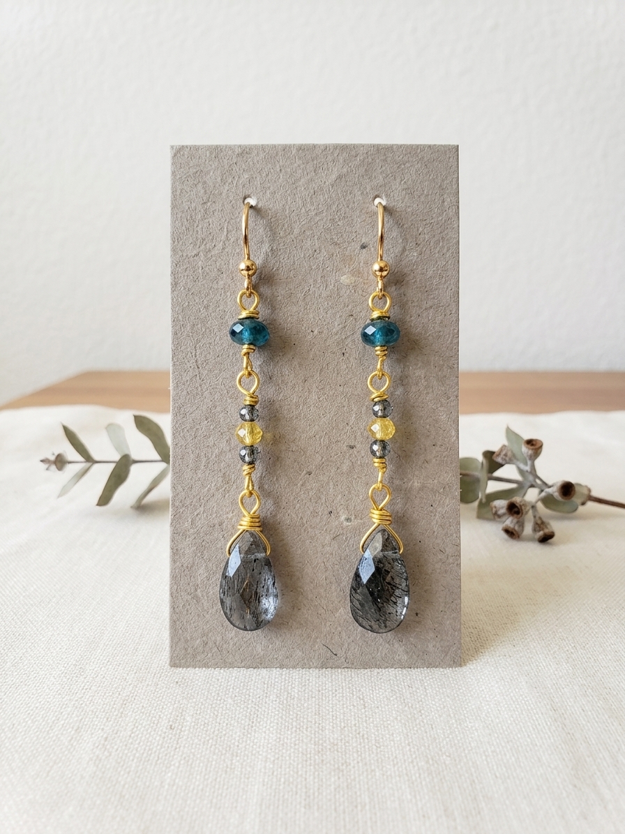 Flotsum and Jetsum- featuring Flat Faceted Kyanite Briolettes, Faceted Round Yellow Quartz, Faceted Round Kyanite, Faceted Neon Apatite, Gold Plated Stainless Steel Wire, Gold Plated Copper Wire, Stainless Steel Chain, Nickel Free Gold Plated Stainless Steel Ear Hooks