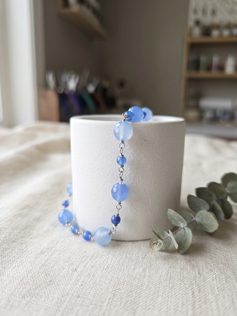 Ode to Andy Sachs' Hideous Sweater - featuring Faceted Baby Blue Jade Rounds, Faceted Cornflower Jade Rounds, Faceted Cerulean Blue Jade Rounds, Stainless Steel Wire, Silver Tone Copper Wire, Stainless Steel Hook and Eye Clasp angle 3