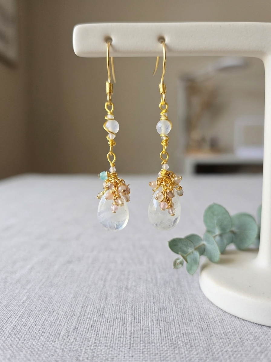 Queen Celestia - featuring Faceted Moonstone Rondelles, Faceted Mystic White Jade Rounds, Rainbow Moonstone Briolettes, Faceted Rose Quartz, Yellow Quartz, Pink Opal, Pink Amethyst, Prehnite and Aquamarine Rounds, Gold Plated Stainless Steel Wire, Gold Plated Copper Wire, Nickel Free Gold Plated Stainless Steel Ear Hooks angle 3