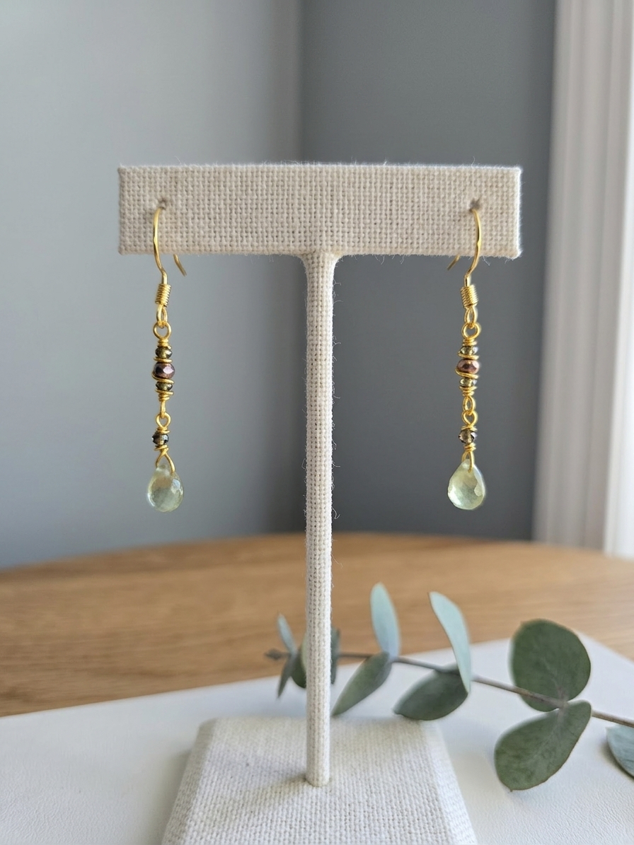 Sir Hiss - featuring Faceted Green Tourmaline Briolettes, Faceted Olive Green Rounds, Gold Plated Faceted Hematite Cubes, Gold Plated Stainless Steel Wire, Gold Plated Copper Wire, Nickel Free Gold Plated Stainless Steel Ear Hooks
